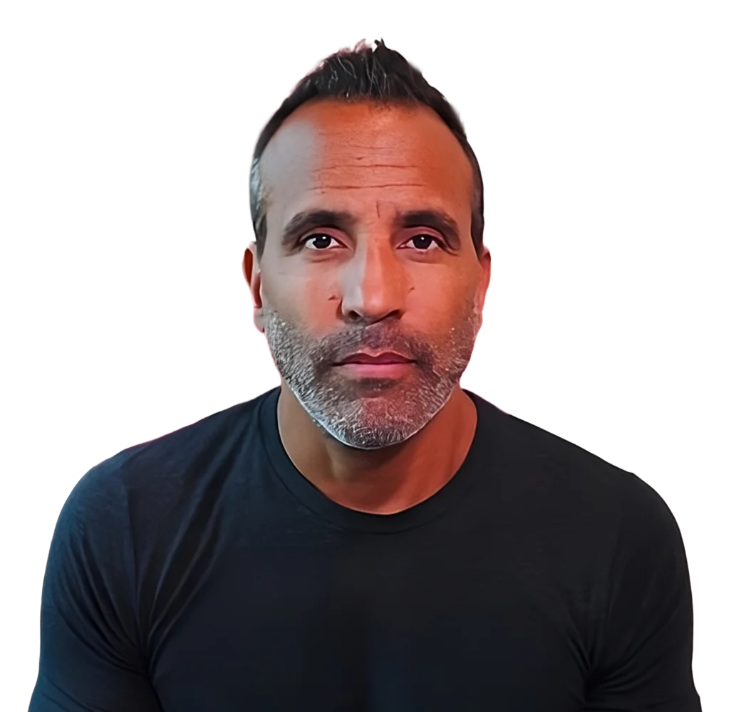 Keenan, the AI sales coach, arms folded, looking directly at you